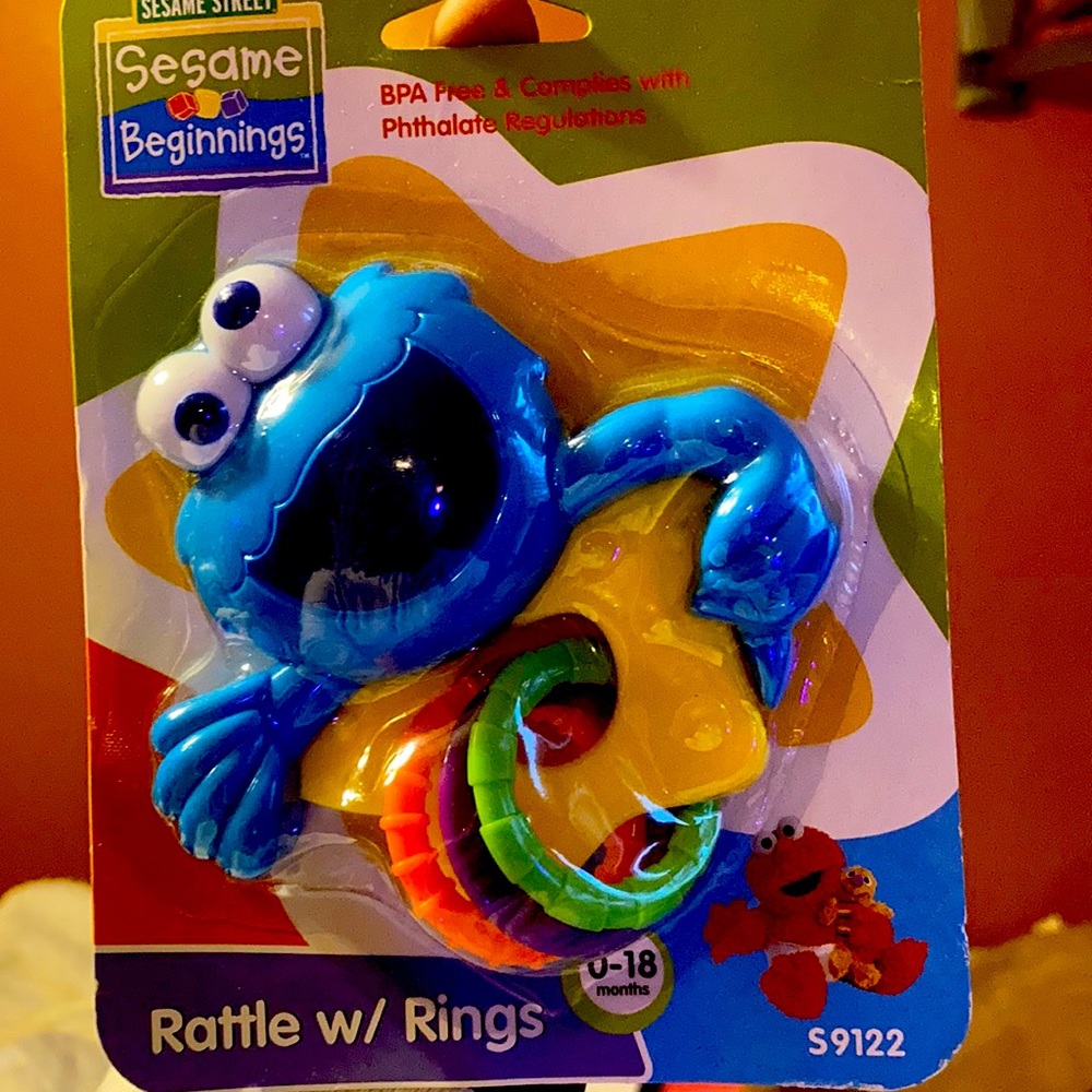 Rattle with rings